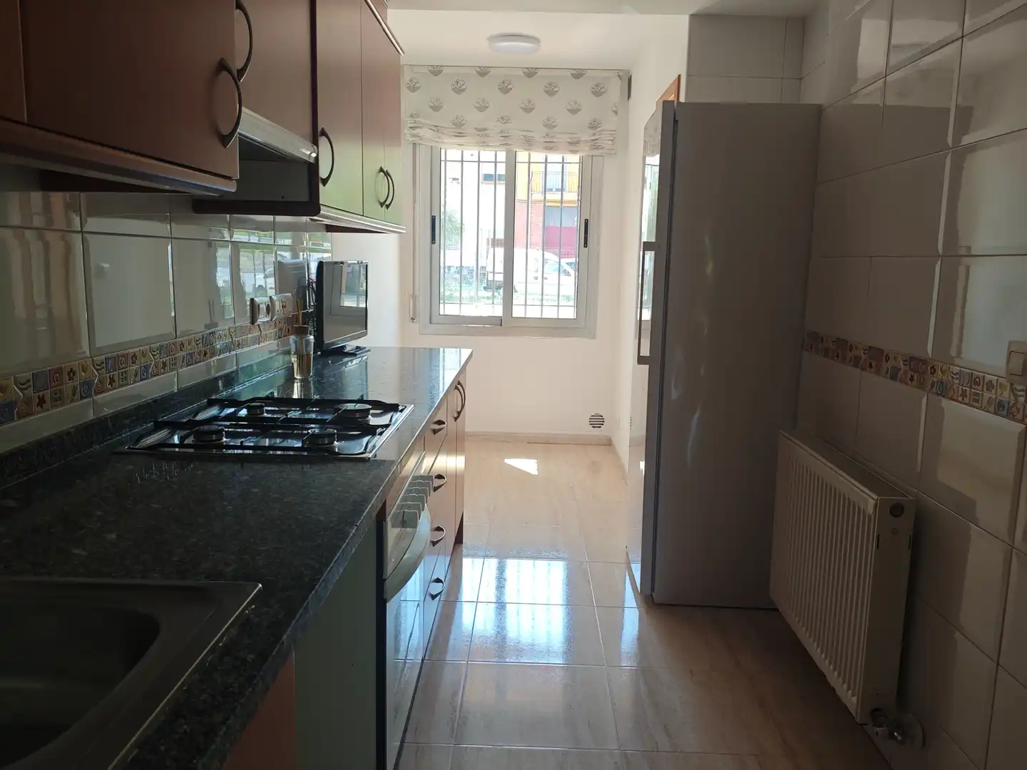 Cuina de Casa adosada de lloguer en Sarrià de Ter amb Aire condicionat, Calefacció i Jardí privat
