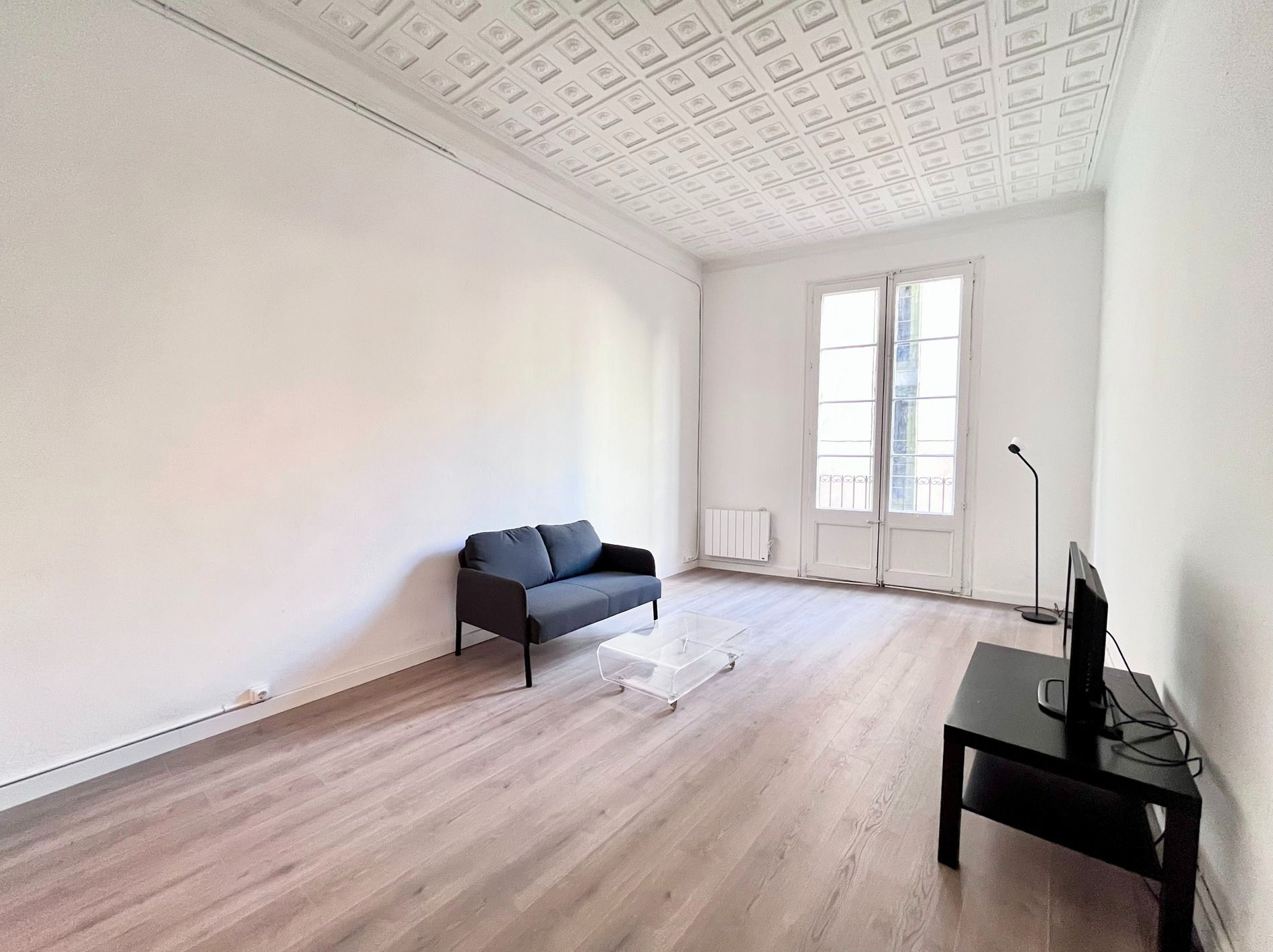 Sala d'estar de Pis de lloguer en  Barcelona Capital amb Calefacció, Parquet i Moblat