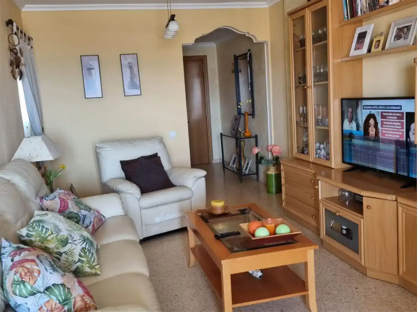 Sala d'estar de Apartament de lloguer en El Puig de Santa Maria amb Aire condicionat, Jardí privat i Terrassa