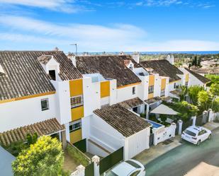 Exterior view of Single-family semi-detached for sale in Estepona  with Air Conditioner, Terrace and Swimming Pool
