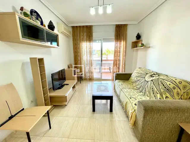 Sala d'estar de Apartament en venda en Oropesa del Mar / Orpesa amb Aire condicionat, Jardí privat i Terrassa