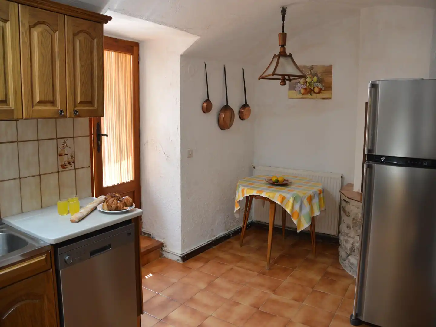 Cuina de Casa adosada en venda en Sant Llorenç de la Muga amb Jardí privat, Terrassa i Traster