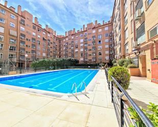 Swimming pool of Flat for sale in  Madrid Capital  with Air Conditioner and Swimming Pool