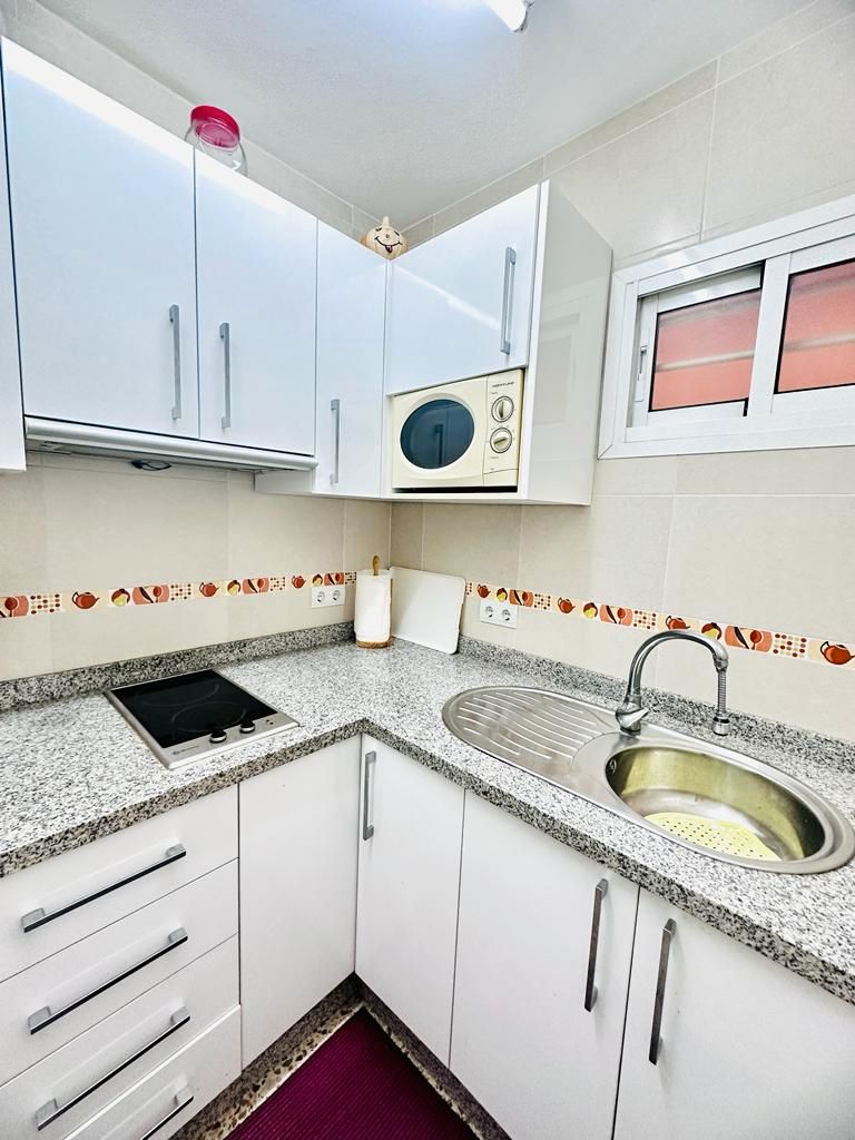 Kitchen of Apartment for sale in Benalmádena  with Air Conditioner, Terrace and Furnished