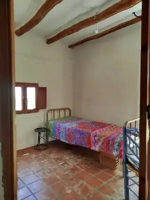 Dormitori de Finca rústica en venda en Alpujarra de la Sierra amb Calefacció, Jardí privat i Moblat