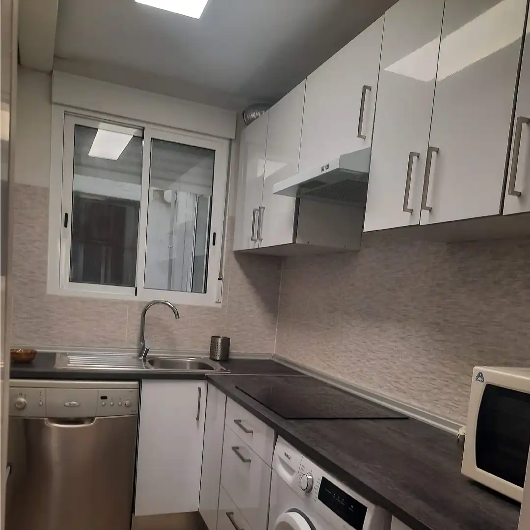 Cuina de Apartament de lloguer en Salou amb Calefacció, Jardí privat i Terrassa