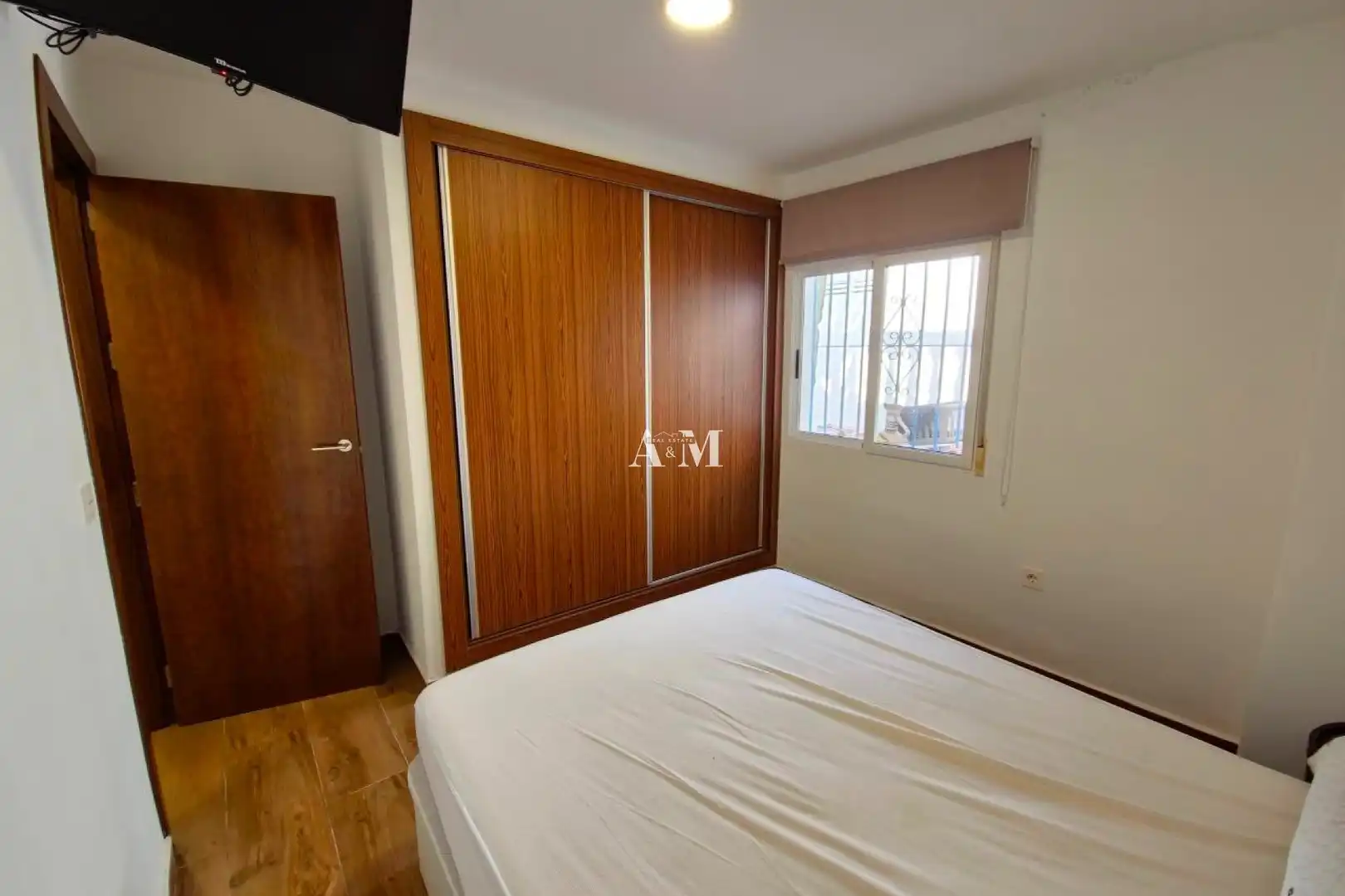 Dormitori de Casa adosada de lloguer en Los Montesinos amb Aire condicionat, Calefacció i Jardí privat