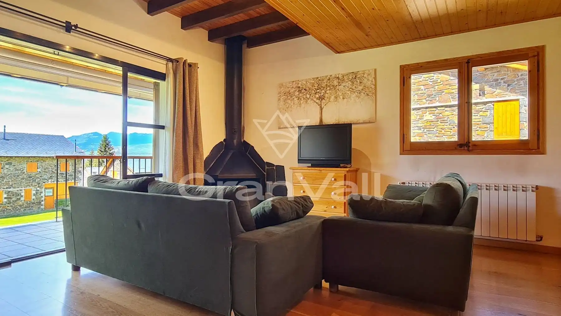 Sala d'estar de Casa adosada en venda en Fontanals de Cerdanya amb Jardí privat, Terrassa i Traster