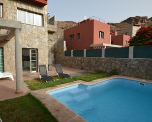 Piscina de Casa o xalet en venda en Mogán amb Jardí privat, Terrassa i Piscina