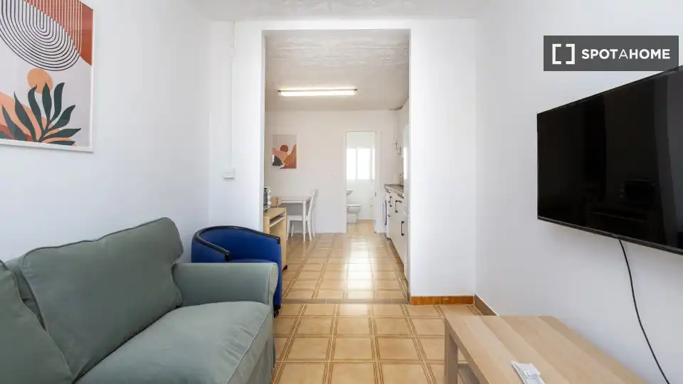 Sala de estar de Apartamento para compartir en Escúzar con Aire acondicionado, Terraza y Amueblado