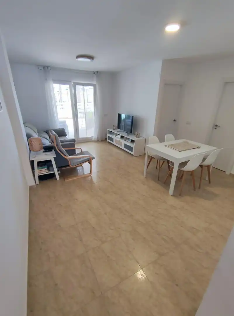 Sala de estar de Apartamento en venta en Tavernes de la Valldigna con Terraza y Piscina comunitaria