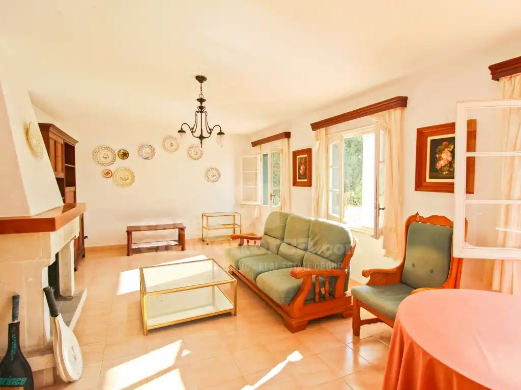 Sala de estar de Finca rústica en venta en Ferreries con Aire acondicionado, Calefacción y Jardín privado