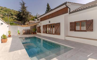 Vista exterior de Casa o xalet en venda en Pinos Genil amb Aire condicionat, Terrassa i Piscina