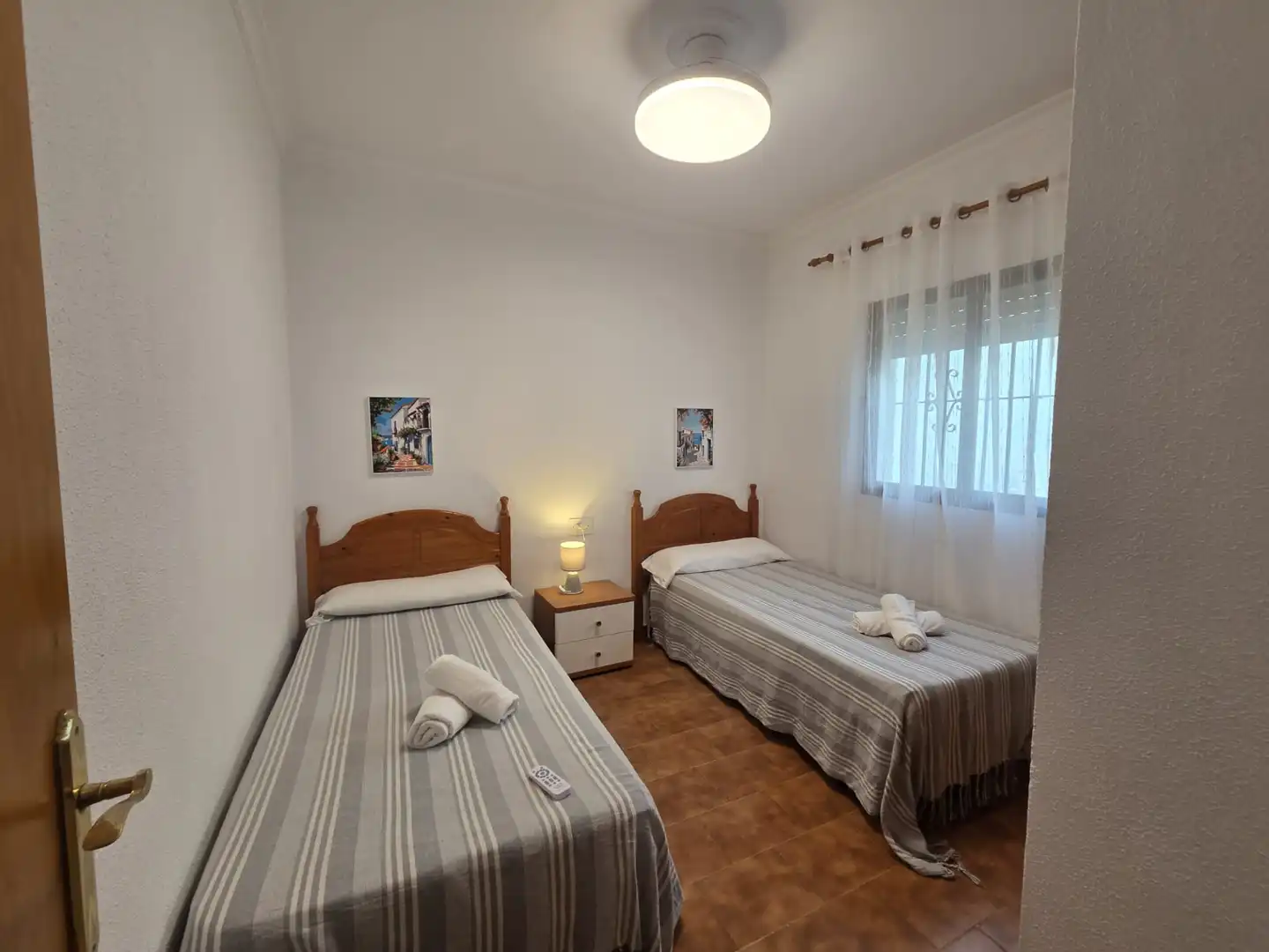 Dormitori de Casa adosada de lloguer en Conil de la Frontera amb Aire condicionat, Terrassa i Piscina