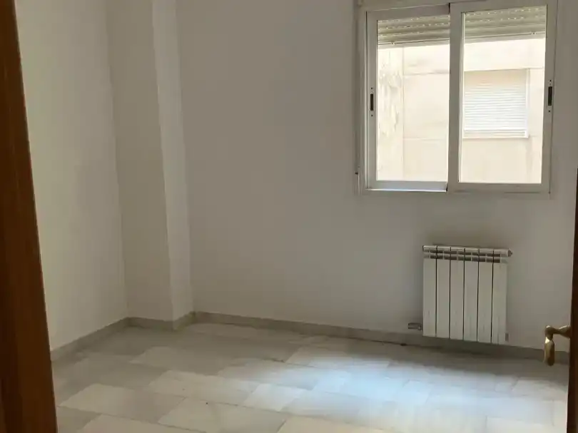 Dormitori de Pis de lloguer en Granada amb Aire condicionat, Traster i Balcó
