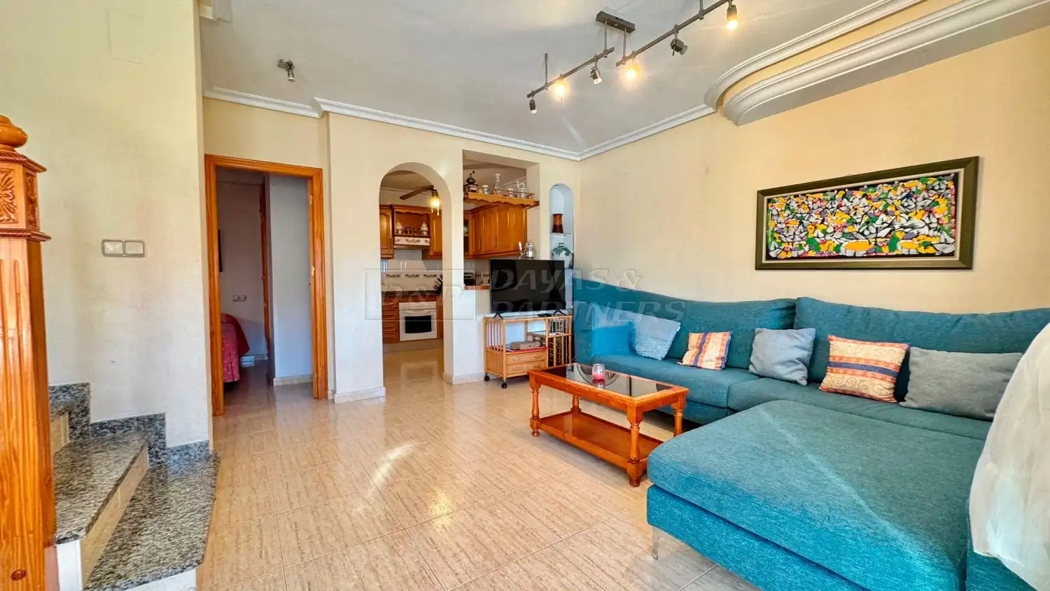 Sala d'estar de Casa adosada en venda en Orihuela amb Jardí privat, Terrassa i Piscina comunitària