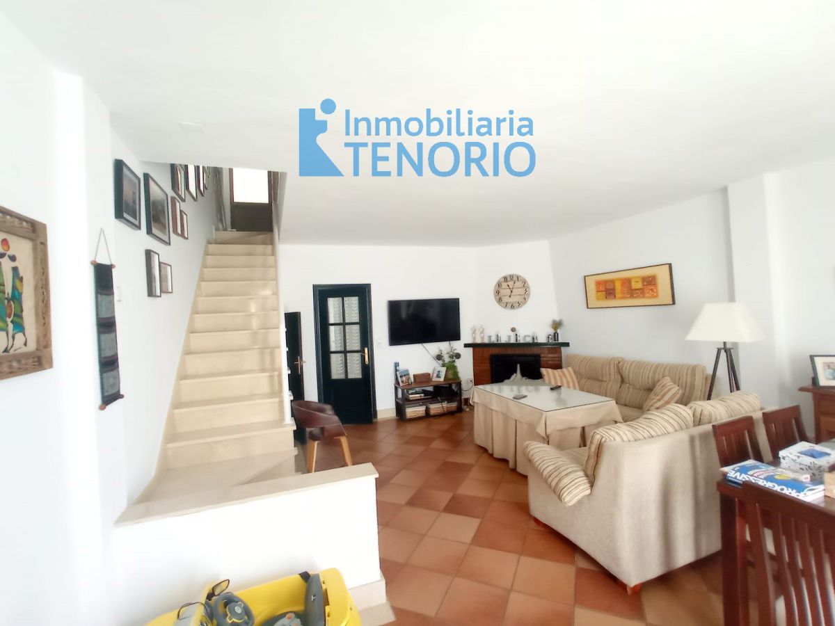 Sala d'estar de Casa adosada en venda en La Antilla amb Aire condicionat i Terrassa