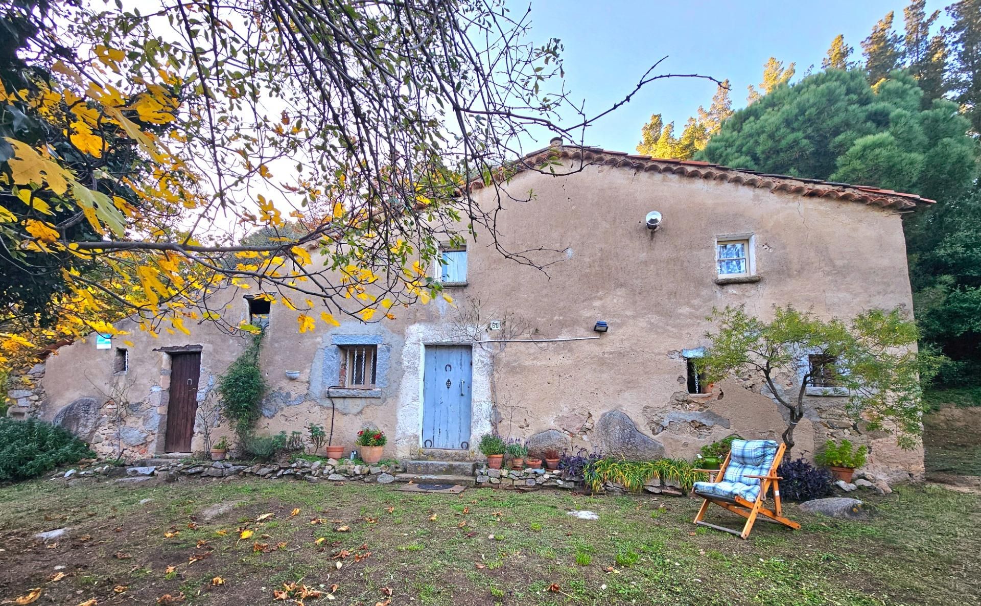 Vista exterior de Finca rústica en venda en Riells i Viabrea amb Jardí privat