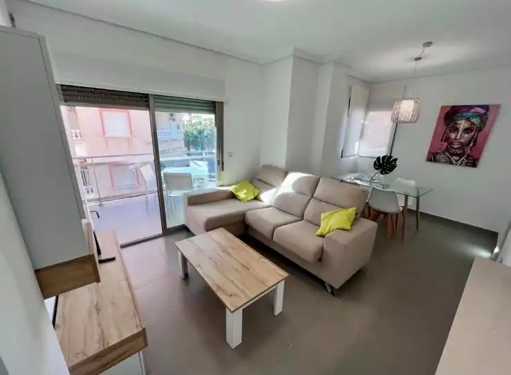Sala d'estar de Apartament de lloguer en Guardamar del Segura amb Aire condicionat, Calefacció i Moblat