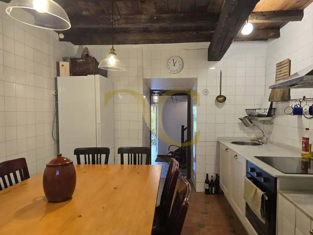 Cuina de Casa adosada en venda en Llanes amb Calefacció, Jardí privat i Terrassa
