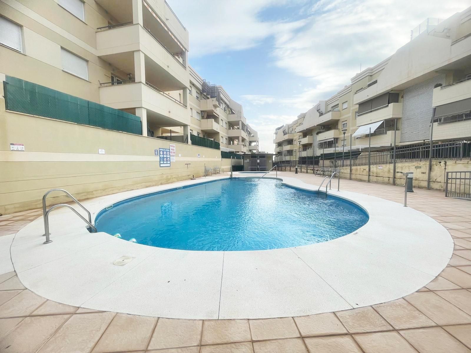 Swimming pool of Apartment for sale in Torrox  with Air Conditioner, Heating and Terrace