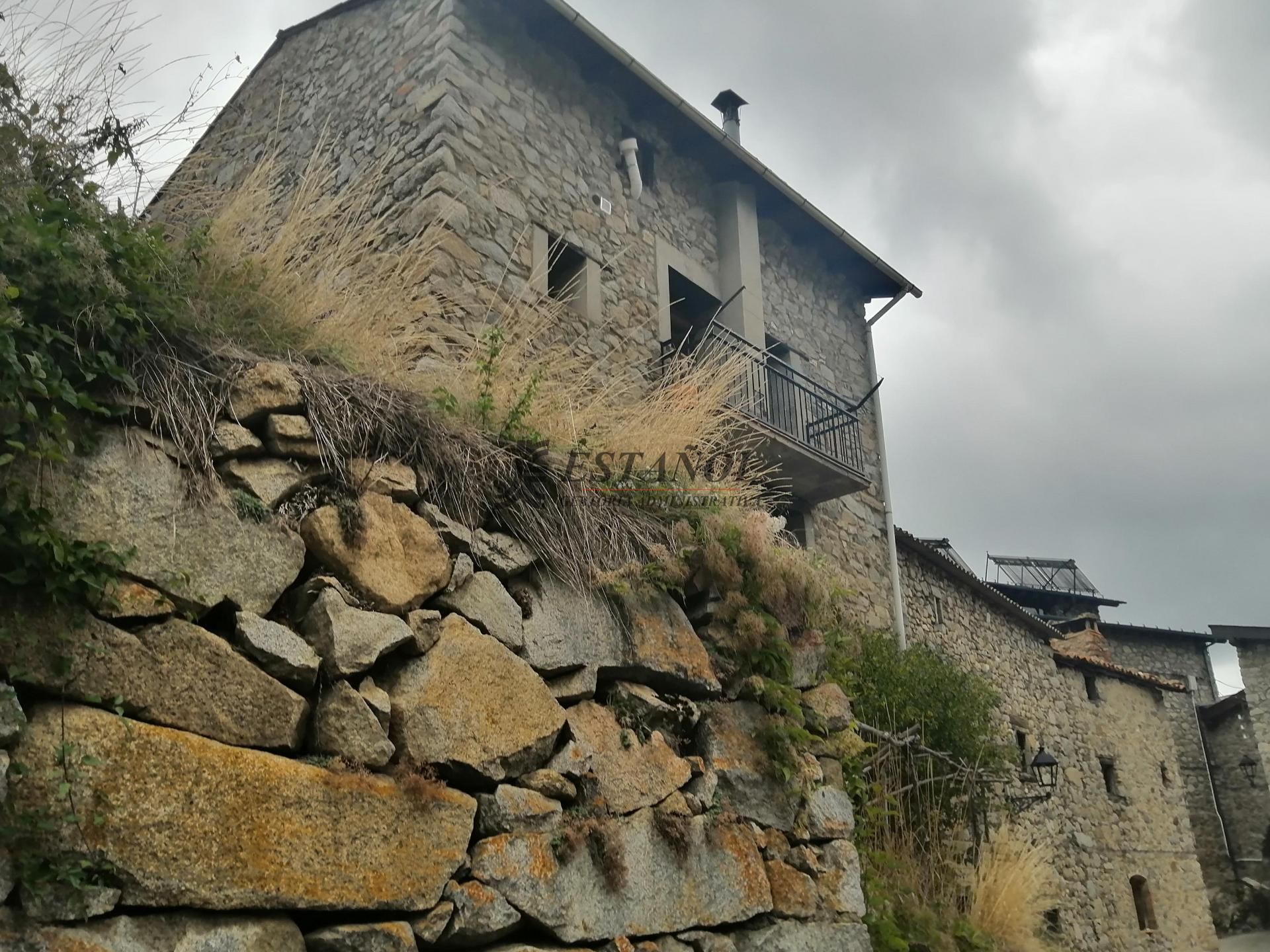 Casa adosada en venda