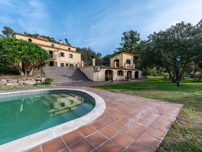 Exterior view of Country house for sale in La Roca del Vallès  with Air Conditioner, Terrace and Swimming Pool