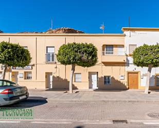 Exterior view of Single-family semi-detached for sale in Balanegra  with Private garden, Terrace and Furnished