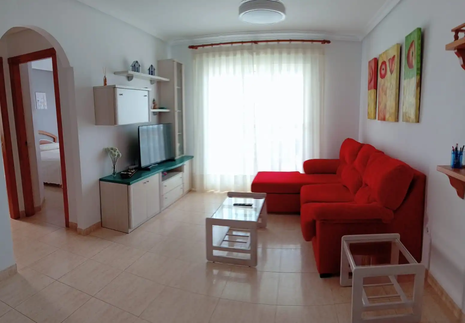 Sala d'estar de Apartament de lloguer en La Manga del Mar Menor amb Calefacció, Piscina i Moblat