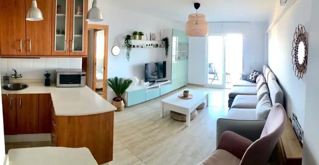 Sala d'estar de Apartament de lloguer en La Manga del Mar Menor amb Aire condicionat, Calefacció i Piscina
