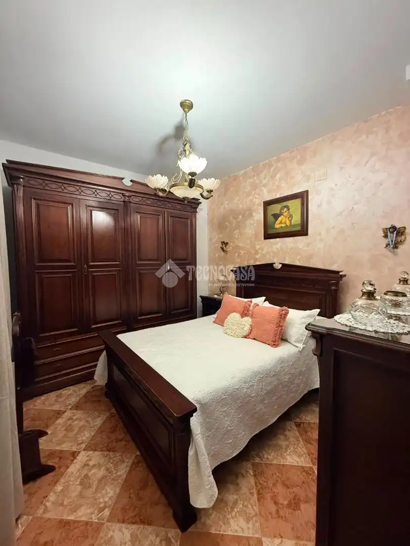Dormitori de Casa adosada en venda en Almonte amb Aire condicionat