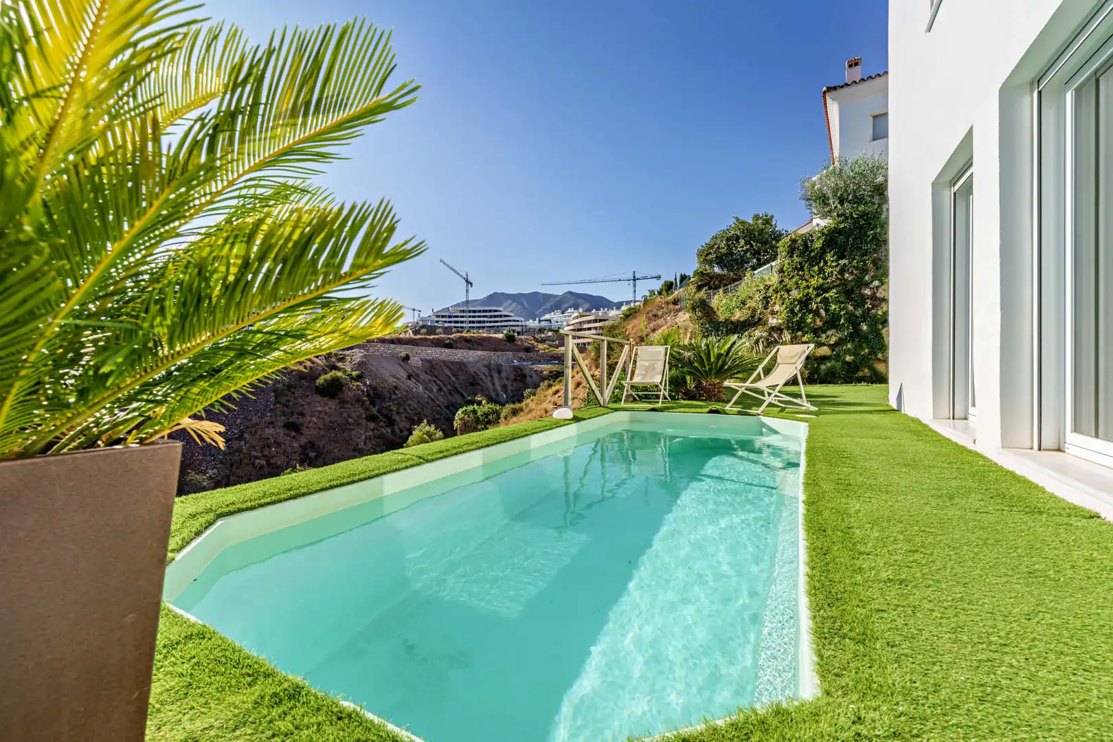 Piscina de Casa adosada en venda en Benalmádena amb Aire condicionat, Jardí privat i Terrassa