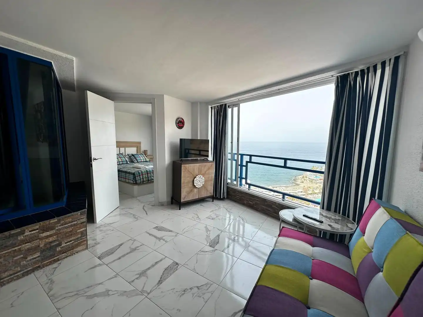Sala de estar de Apartamento de alquiler en Mogán con Amueblado, Balcón y Piscina comunitaria