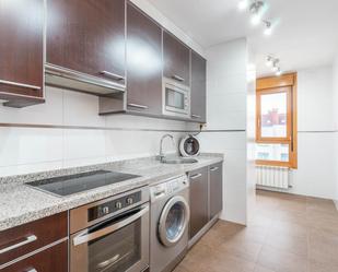 Kitchen of Apartment for sale in Gijón   with Heating, Private garden and Storage room