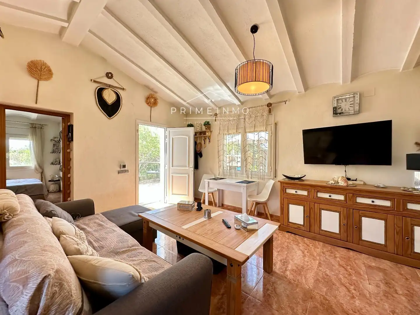Sala de estar de Finca rústica en venta en L'Ampolla con Aire acondicionado, Calefacción y Terraza