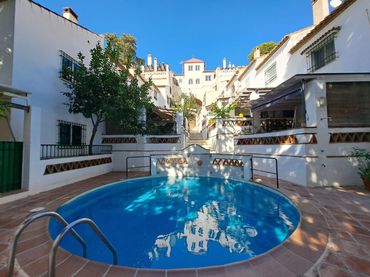 Adossat amb piscina en venda a Calle Loma de los Riscos