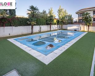 Swimming pool of Flat for sale in  Granada Capital  with Heating, Private garden and Parquet flooring