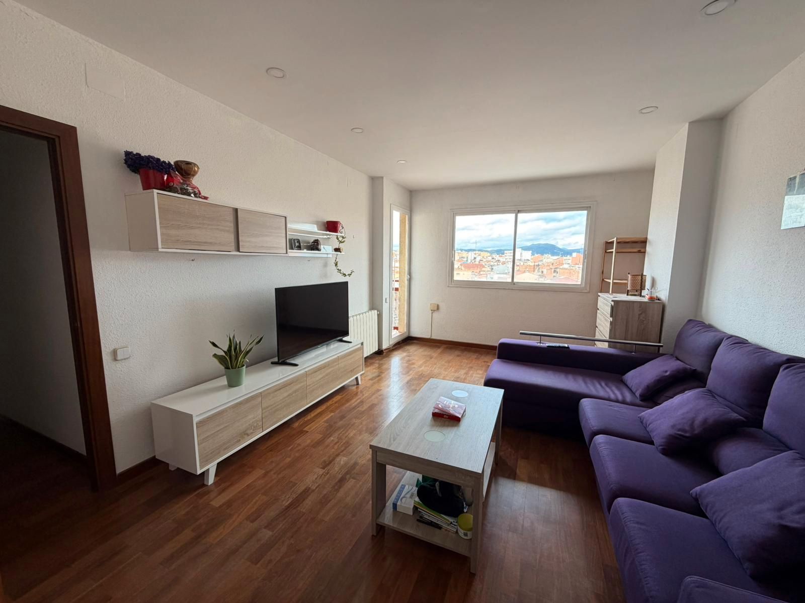 Living room of Flat for sale in Sabadell  with Heating, Parquet flooring and Balcony