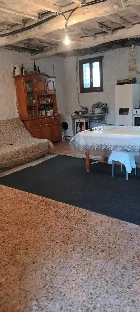 Sala d'estar de Casa adosada en venda en Grado