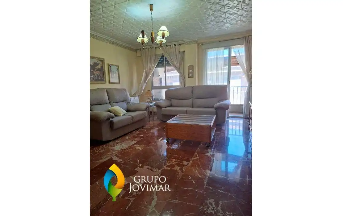 Sala de estar de Piso en venta en Guadix con Calefacción, Terraza y Amueblado