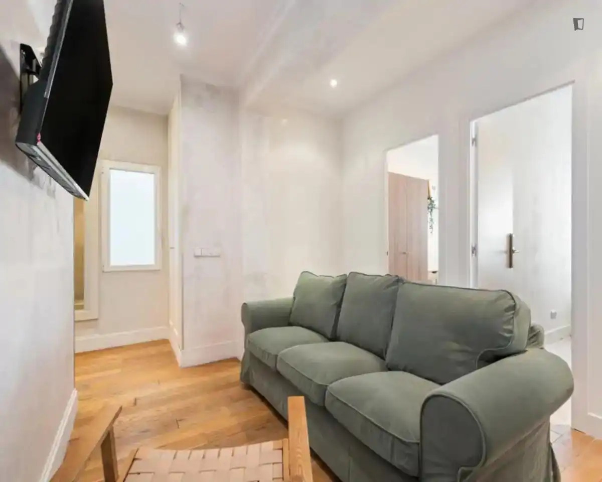 Sala de estar de Apartamento para compartir en Madrid con Aire acondicionado, Calefacción y Amueblado