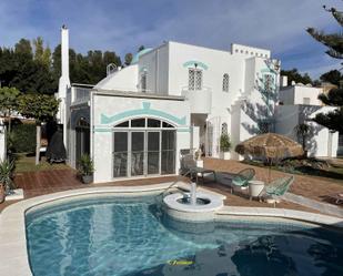 Exterior view of House or chalet for sale in Roquetas de Mar  with Air Conditioner, Terrace and Swimming Pool