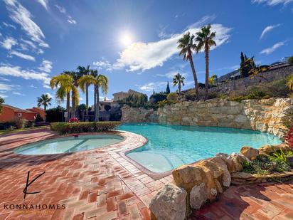 Swimming pool of Single-family semi-detached for sale in Polop  with Air Conditioner, Heating and Private garden