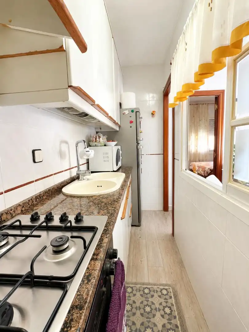 Kitchen of Flat for sale in El Masnou  with Air Conditioner, Storage room and Oven