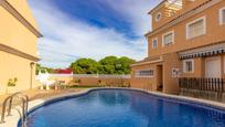 Swimming pool of Single-family semi-detached for sale in Guardamar del Segura  with Air Conditioner and Swimming Pool