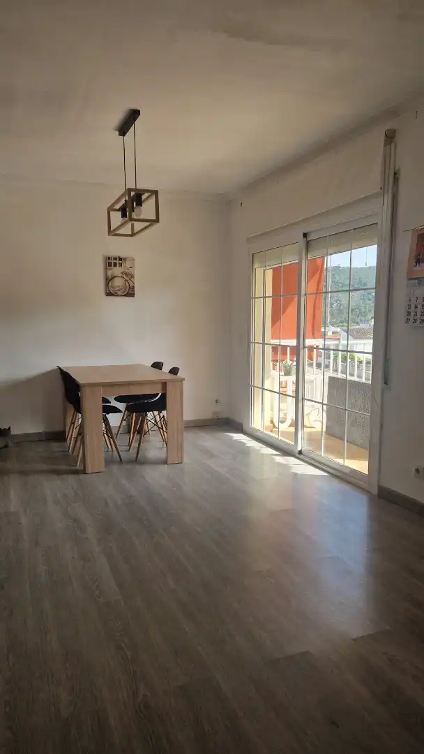 Menjador de Casa adosada en venda en Santa Coloma de Farners amb Calefacció, Jardí privat i Parquet