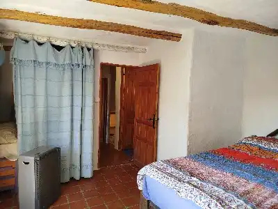 Dormitori de Finca rústica en venda en Alpujarra de la Sierra amb Calefacció, Jardí privat i Moblat