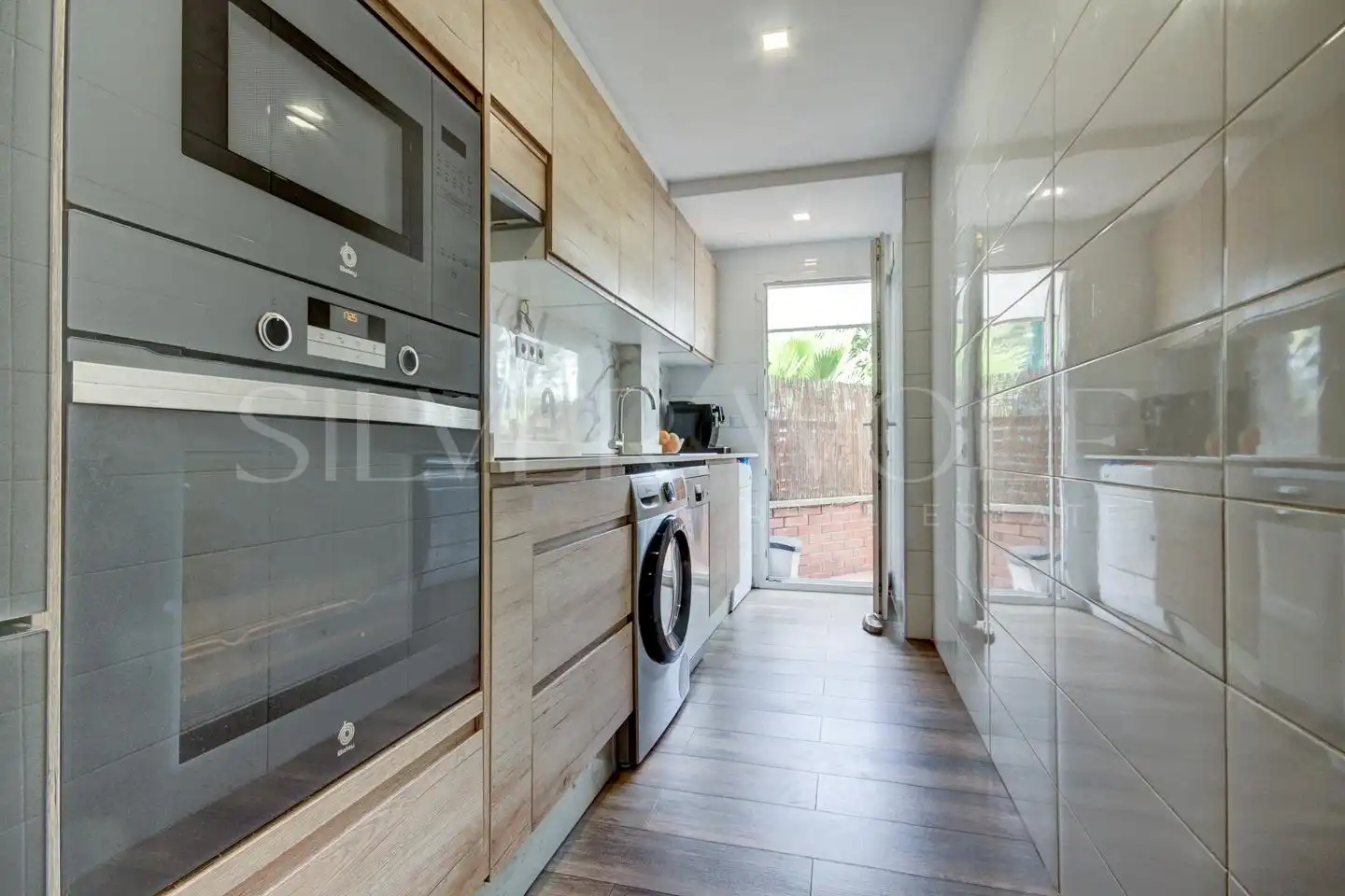 Kitchen of Ground floor for sale in Vilanova i la Geltrú  with Air Conditioner, Private garden and Terrace