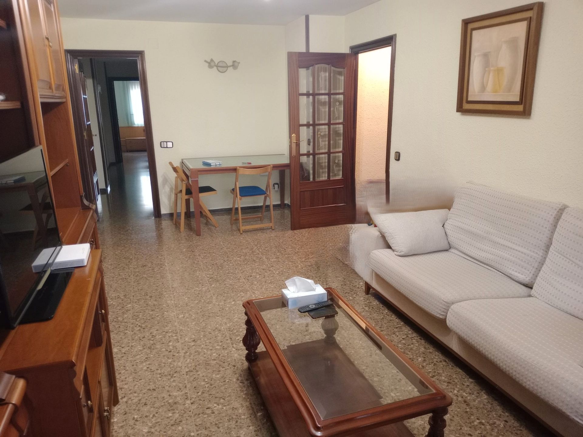 Sala d'estar de Pis en venda en Santa Coloma de Gramenet amb Calefacció, Traster i Moblat