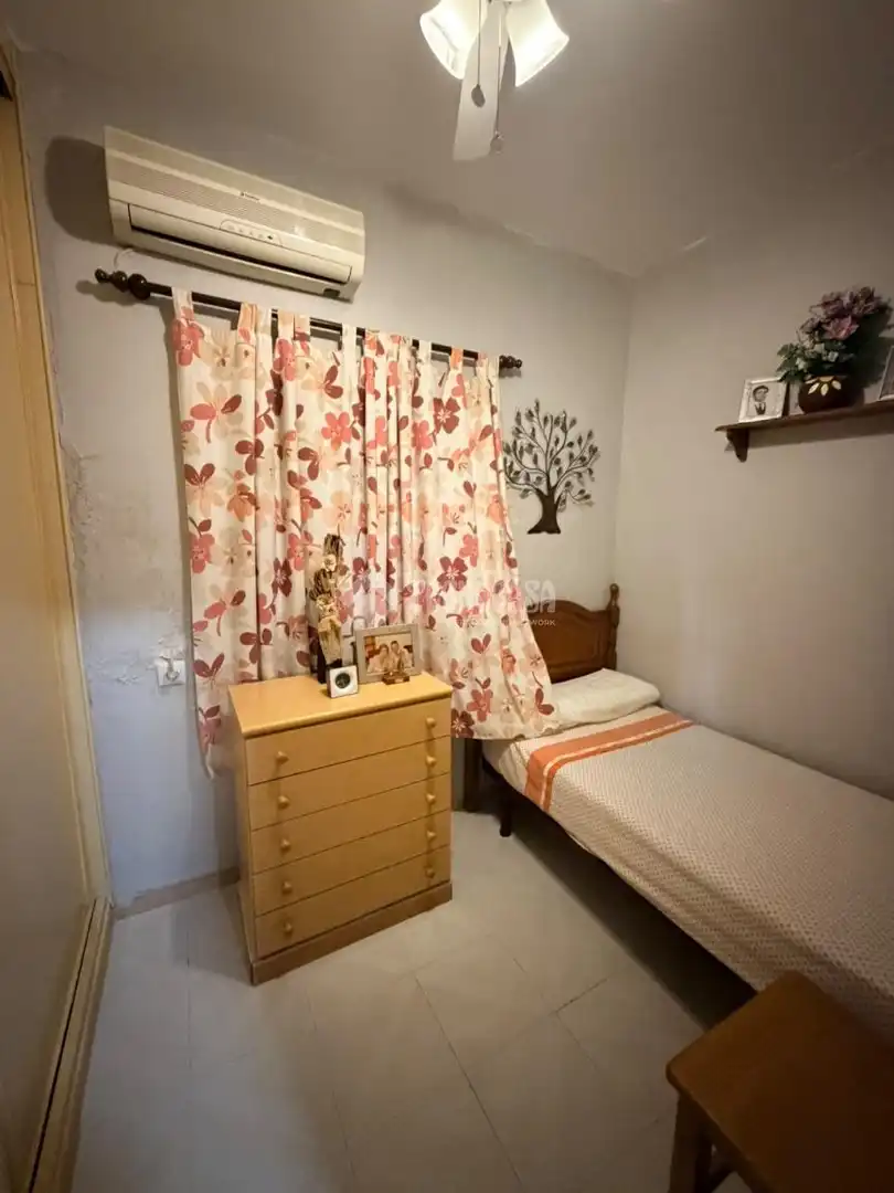 Habitación de Casa adosada en venta en Málaga